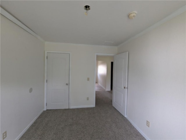 6960 March Pointe Ct, Theodore, AL 36582 - carpeted empty room with baseboards and a smoke detector