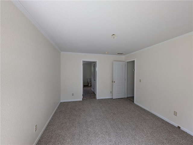 6960 March Pointe Ct, Theodore, AL 36582 - unfurnished bedroom with carpet, crown molding, and connected bathroom