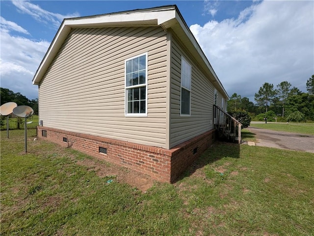 6960 March Pointe Ct, Theodore, AL 36582 - view of side of property with crawl space and a lawn
