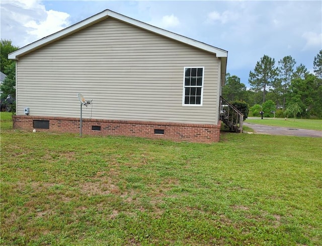 6960 March Pointe Ct, Theodore, AL 36582 - view of side of home featuring crawl space and a lawn