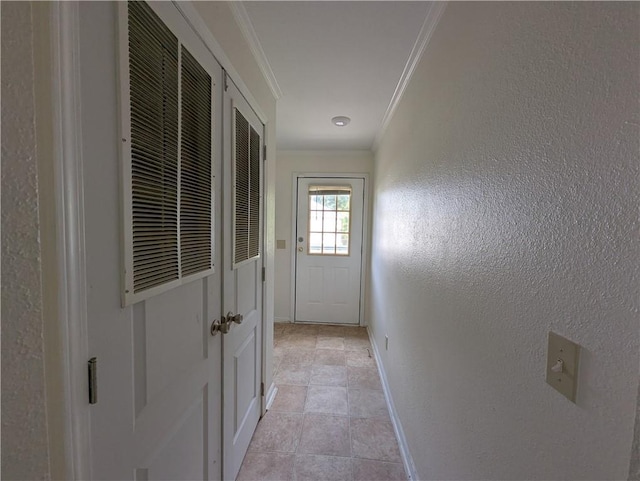 6960 March Pointe Ct, Theodore, AL 36582 - doorway with ornamental molding and a textured wall
