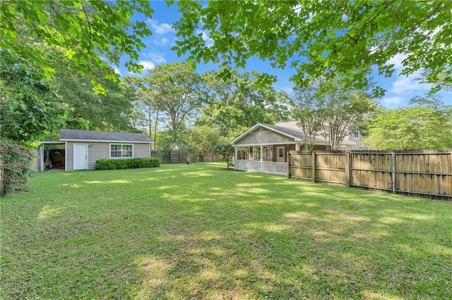 view of yard featuring a fenced backyard and an outdoor structure