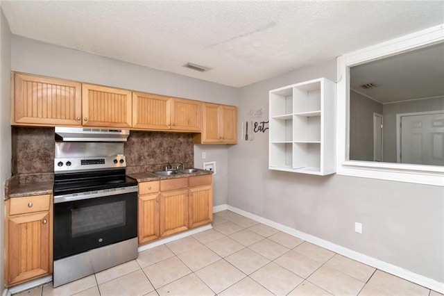 6451 Barker Dr S, Mobile, AL 36608 - kitchen with electric stove, under cabinet range hood, decorative backsplash, a sink, and light tile patterned flooring