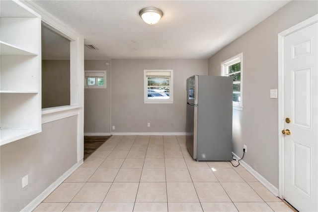 6451 Barker Dr S, Mobile, AL 36608 - entrance foyer featuring light tile patterned flooring and baseboards