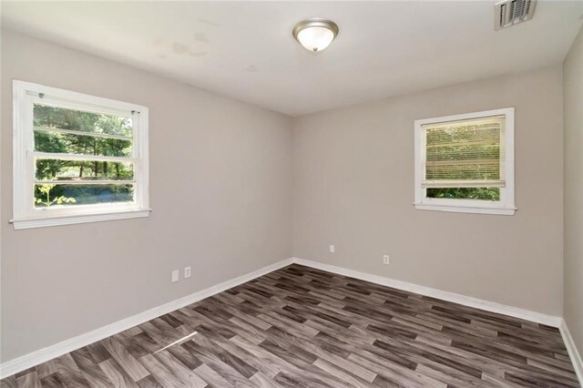 6451 Barker Dr S, Mobile, AL 36608 - spare room with dark wood finished floors and baseboards