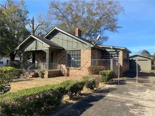 view of front facade with a porch and a carport