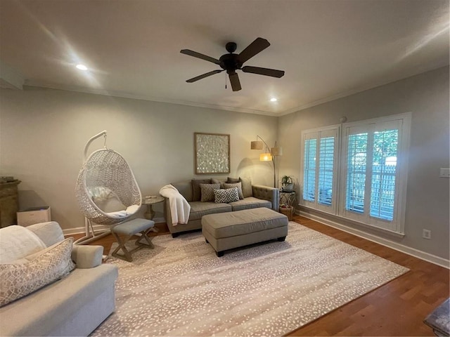 sitting room featuring recessed lighting, wood finished floors, a ceiling fan, baseboards, and ornamental molding