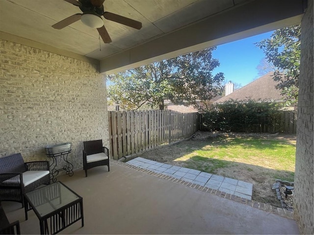 view of patio / terrace with ceiling fan and a fenced backyard