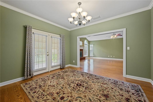 interior space with crown molding and hardwood / wood-style floors