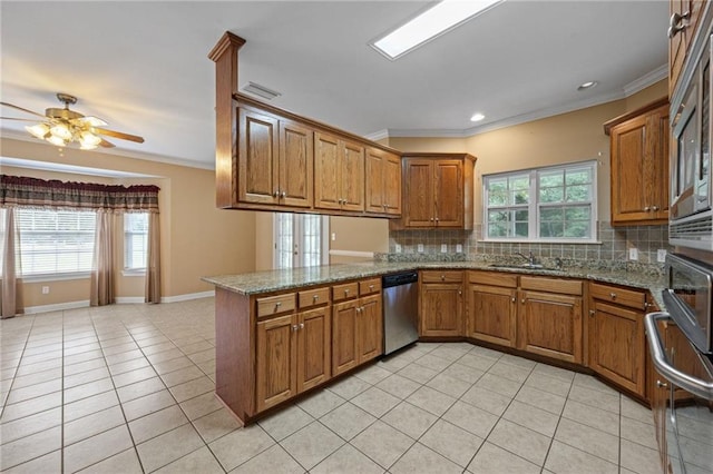 kitchen with tasteful backsplash, stone countertops, light tile patterned floors, kitchen peninsula, and dishwasher