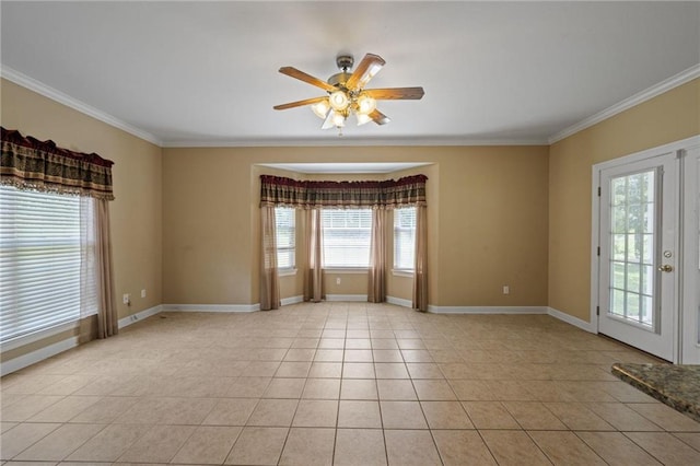 spare room featuring light tile patterned flooring, ceiling fan, and crown molding