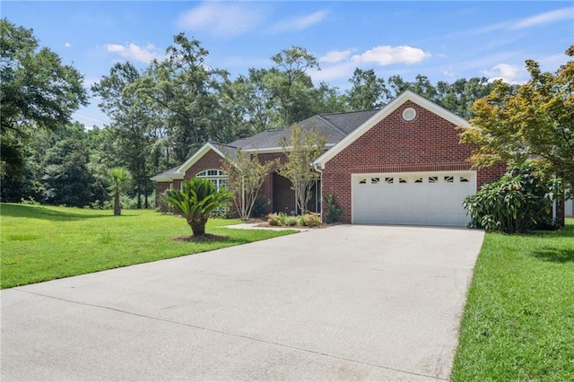 ranch-style house featuring a garage and a front lawn