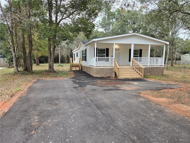 view of front of home featuring covered porch