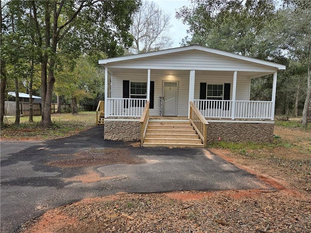 view of front of home featuring covered porch