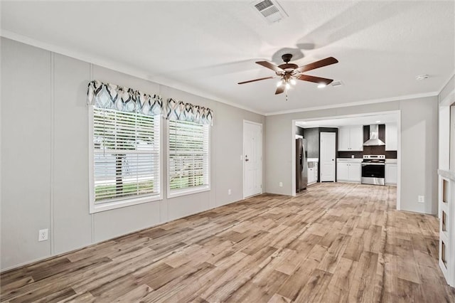 unfurnished living room with crown molding, ceiling fan, and light wood-type flooring