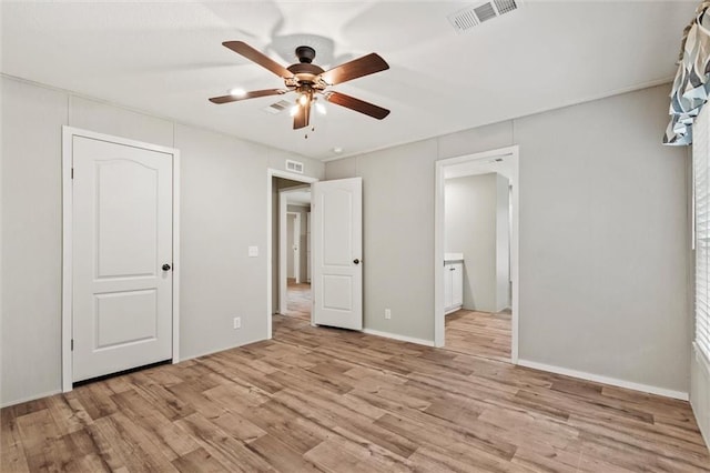 unfurnished bedroom featuring ceiling fan and light hardwood / wood-style floors