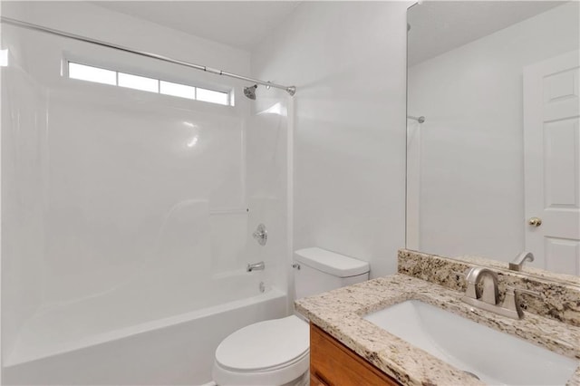 full bathroom with vanity,  shower combination, and toilet