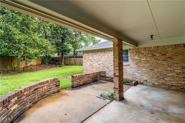 601 Willow Brook Run E, Mobile, AL 36608 - fenced backyard featuring a patio