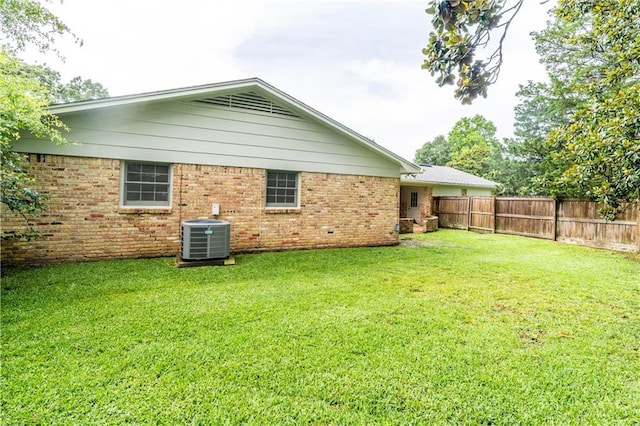 601 Willow Brook Run E, Mobile, AL 36608 - rear view of property with brick siding and a fenced backyard