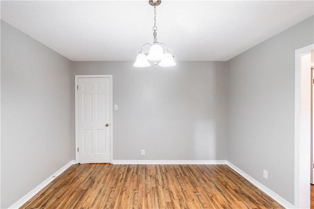601 Willow Brook Run E, Mobile, AL 36608 - empty room with a chandelier and light wood-type flooring