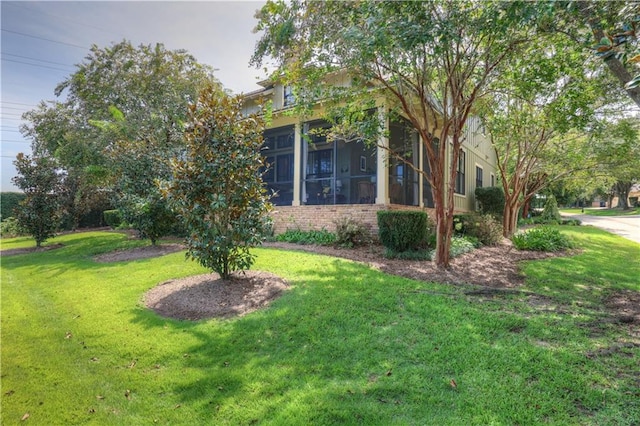 view of home's exterior with a lawn