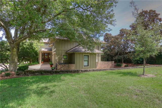 exterior space featuring a front lawn