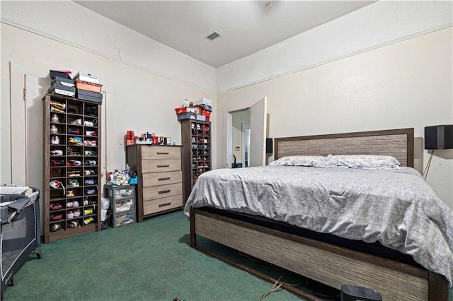 bedroom featuring dark colored carpet