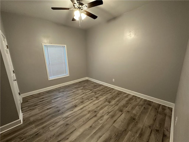 unfurnished bedroom featuring dark hardwood / wood-style floors and ceiling fan