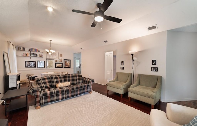 living area with visible vents, wood finished floors, lofted ceiling, and ceiling fan with notable chandelier