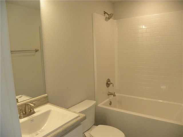 full bathroom featuring  shower combination, toilet, and sink