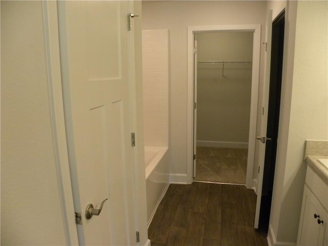 bathroom featuring vanity and hardwood / wood-style flooring