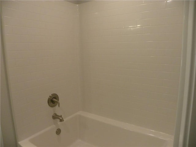 bathroom with shower / bathtub combination