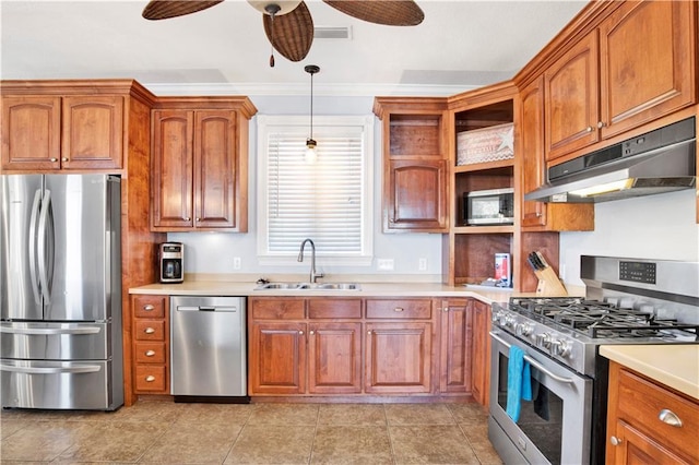 kitchen featuring ceiling fan, sink, stainless steel appliances, pendant lighting, and ornamental molding