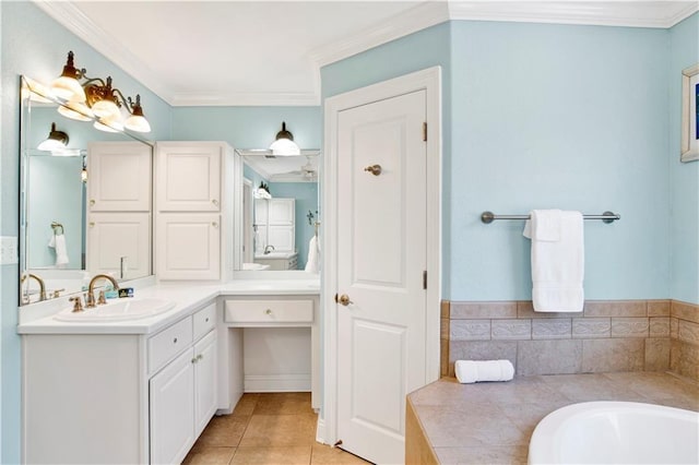 bathroom with crown molding, tile patterned flooring, and vanity