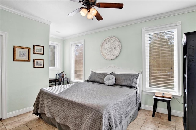 tiled bedroom with multiple windows, ceiling fan, and ornamental molding