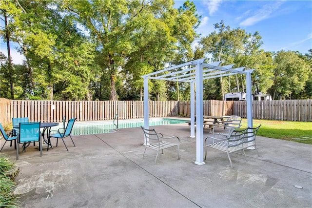 view of patio / terrace featuring a fenced in pool and a pergola