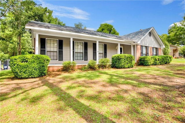 109 Meadow Cir, Daphne, AL 36526 - ranch-style home featuring covered porch, a front yard, and brick siding