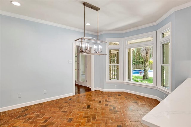 5555 Briarfield Ln, Mobile, AL 36693 - unfurnished dining area with brick flooring, a chandelier, ornamental molding, and recessed lighting