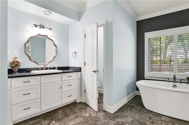 5555 Briarfield Ln, Mobile, AL 36693 - bathroom featuring a freestanding tub, vanity, and ornamental molding