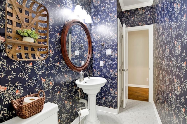 5555 Briarfield Ln, Mobile, AL 36693 - half bathroom with tile patterned floors and crown molding