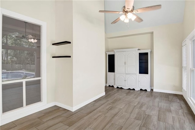 5555 Briarfield Ln, Mobile, AL 36693 - foyer featuring a ceiling fan, light wood-type flooring, and a towering ceiling