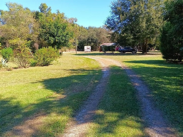 view of road featuring driveway