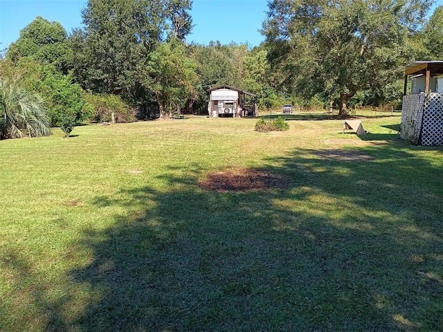 view of yard with a carport
