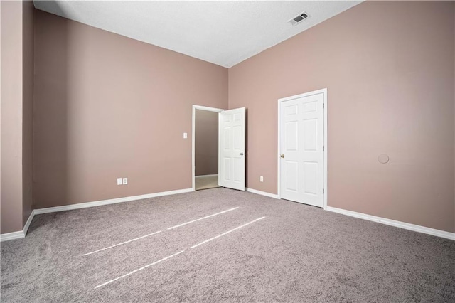 unfurnished bedroom with carpet floors