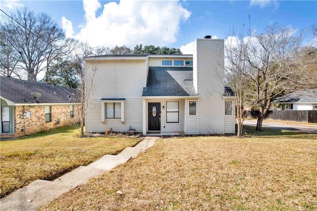 view of front of property with a front lawn