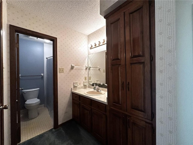 bathroom with wallpapered walls, a textured ceiling, toilet, tile patterned flooring, and vanity