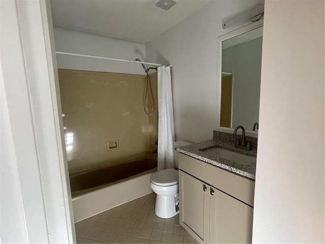 full bathroom featuring vanity, shower / tub combo, tile patterned floors, and toilet