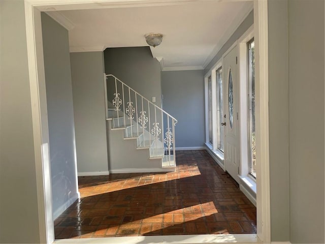 foyer entrance with ornamental molding