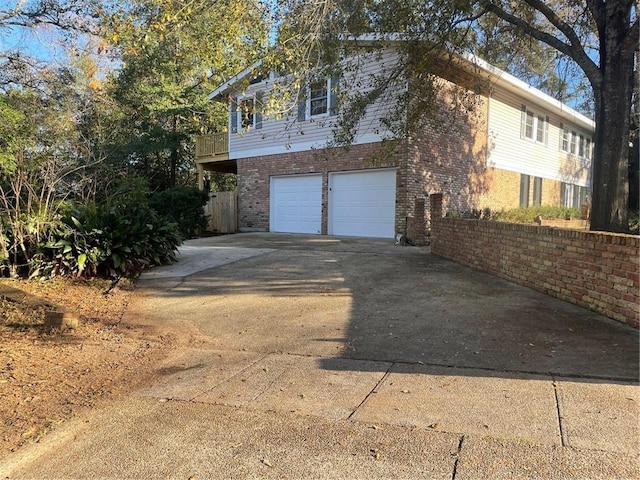 view of home's exterior with a garage