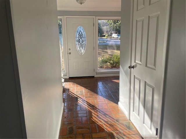 entryway with crown molding